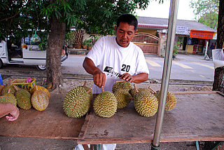 selling durians by the roadside